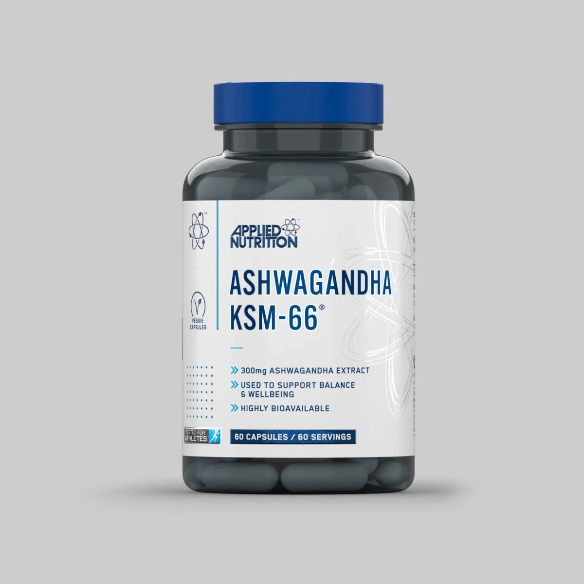 Bottle of Applied Nutrition Ashwagandha KSM-66 supplement on a gray background